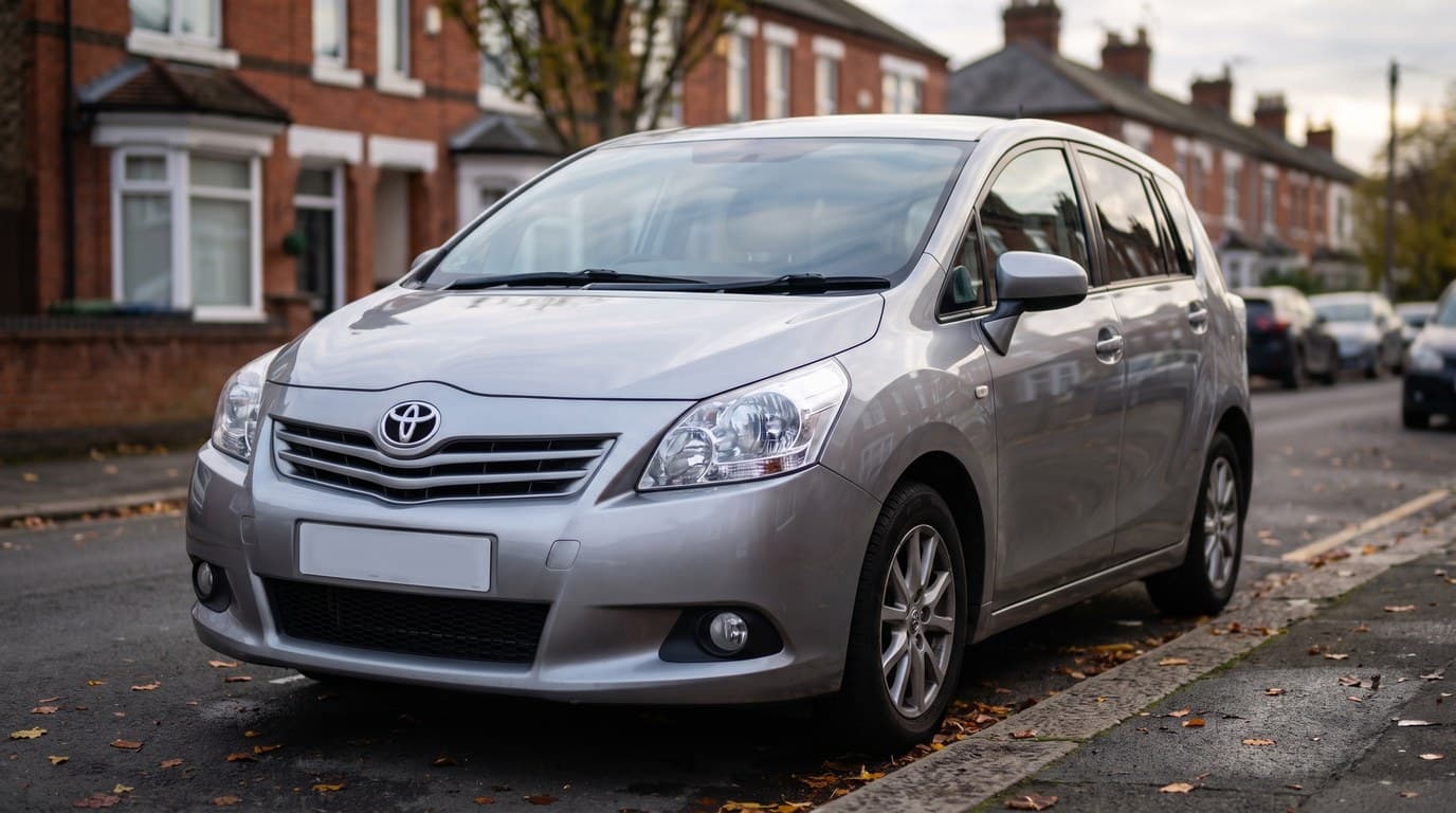 A silver Toyota Verso MPV parked on a UK residential street